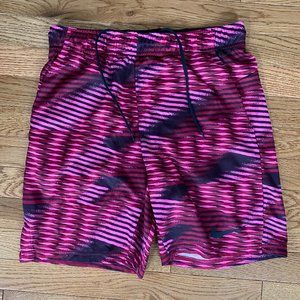 Nike Dri-Fit, pink-patterned shorts. Adult Small